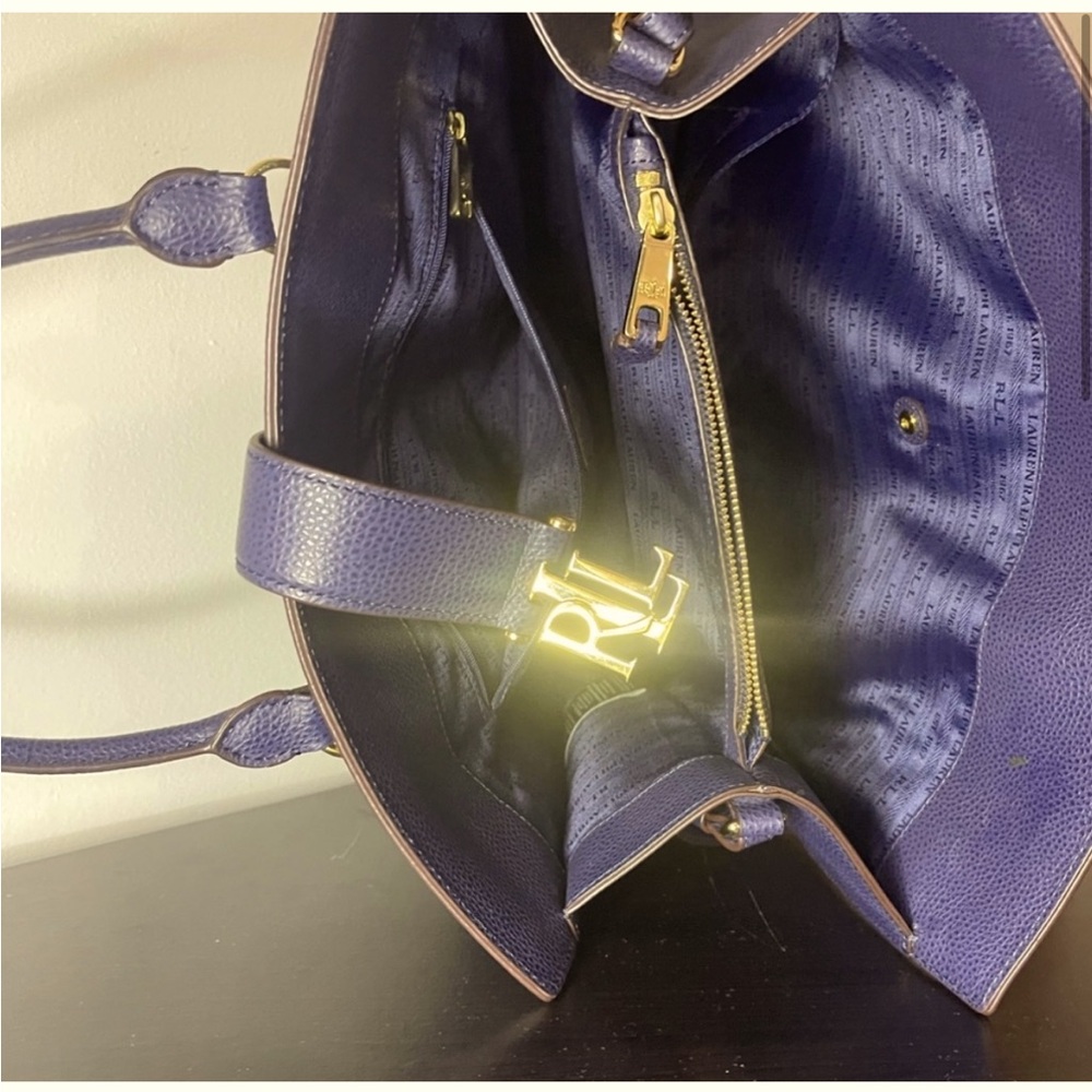 Brand new Ralph Lauren tote. Goes with jeans or a fancy navy blue outfit.